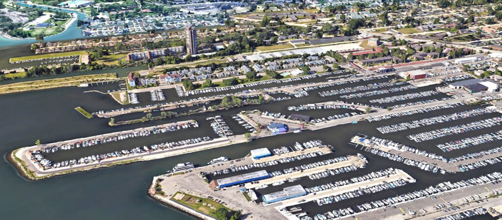 Aerial view of Lake St. Clair Nautical Mile marinas in St. Clair Shores Michigan with boats docked along the waterfront